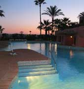Menara Beach pool at sunset